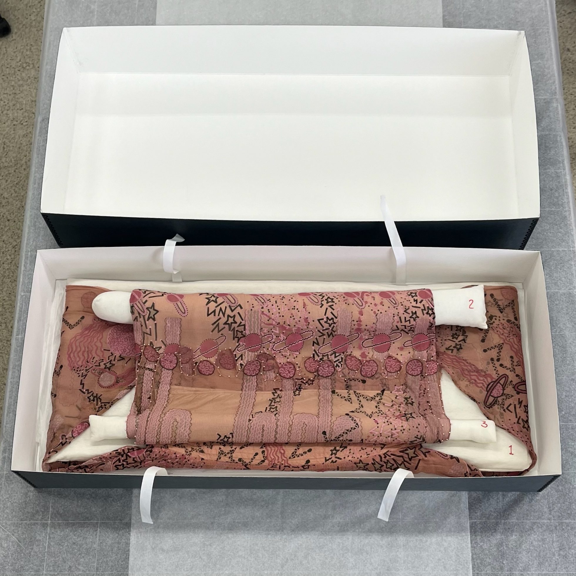 custom storage for textile heirlooms. textile conservation